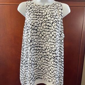 Dalia printed white and black abstract open back blouse